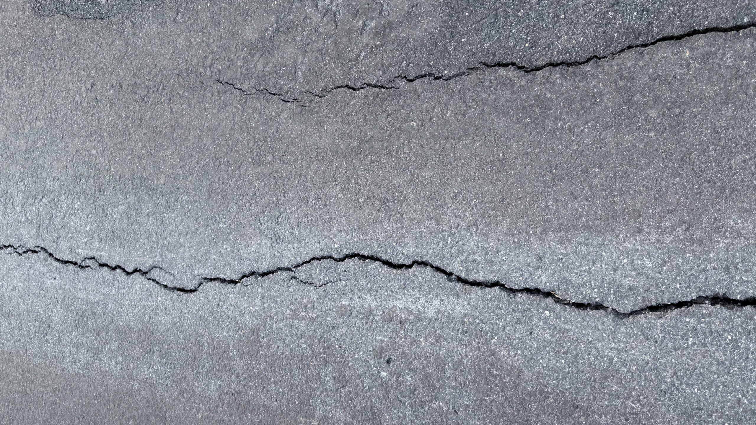 Crack Sealing vs. Patching: What’s Best for Denver’s Changing Climate